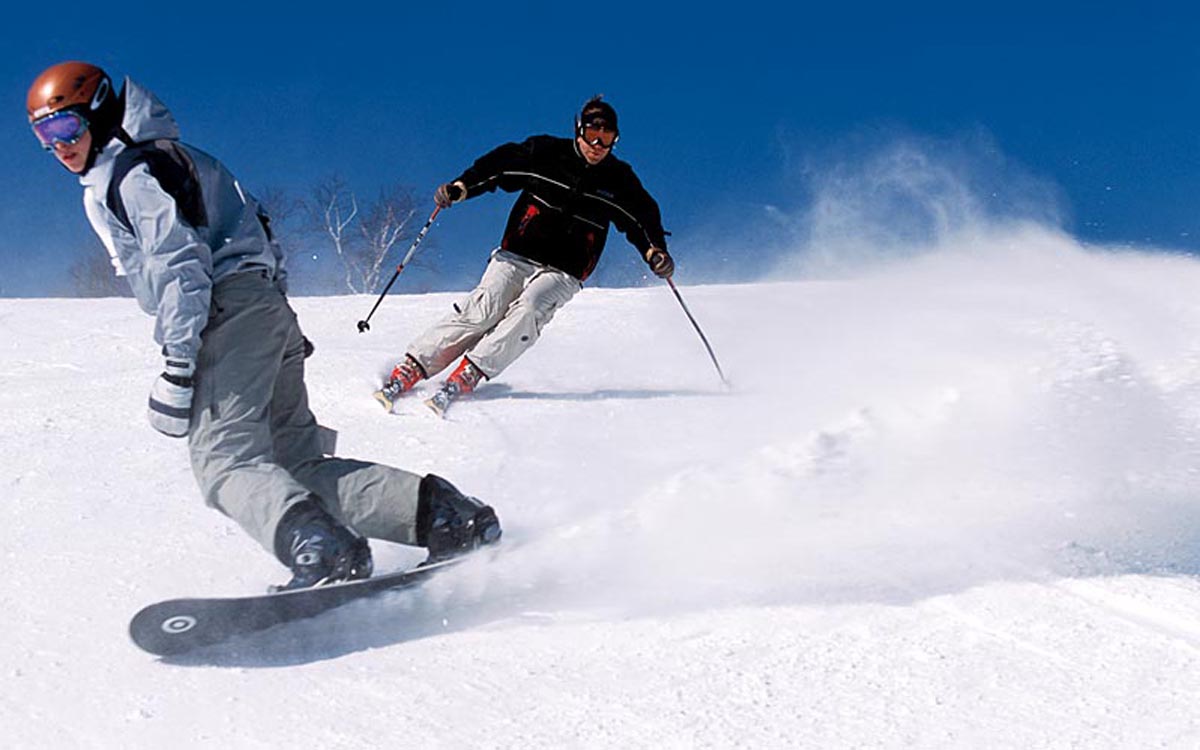 Scontro tra uno sciatore ed uno snowboardista